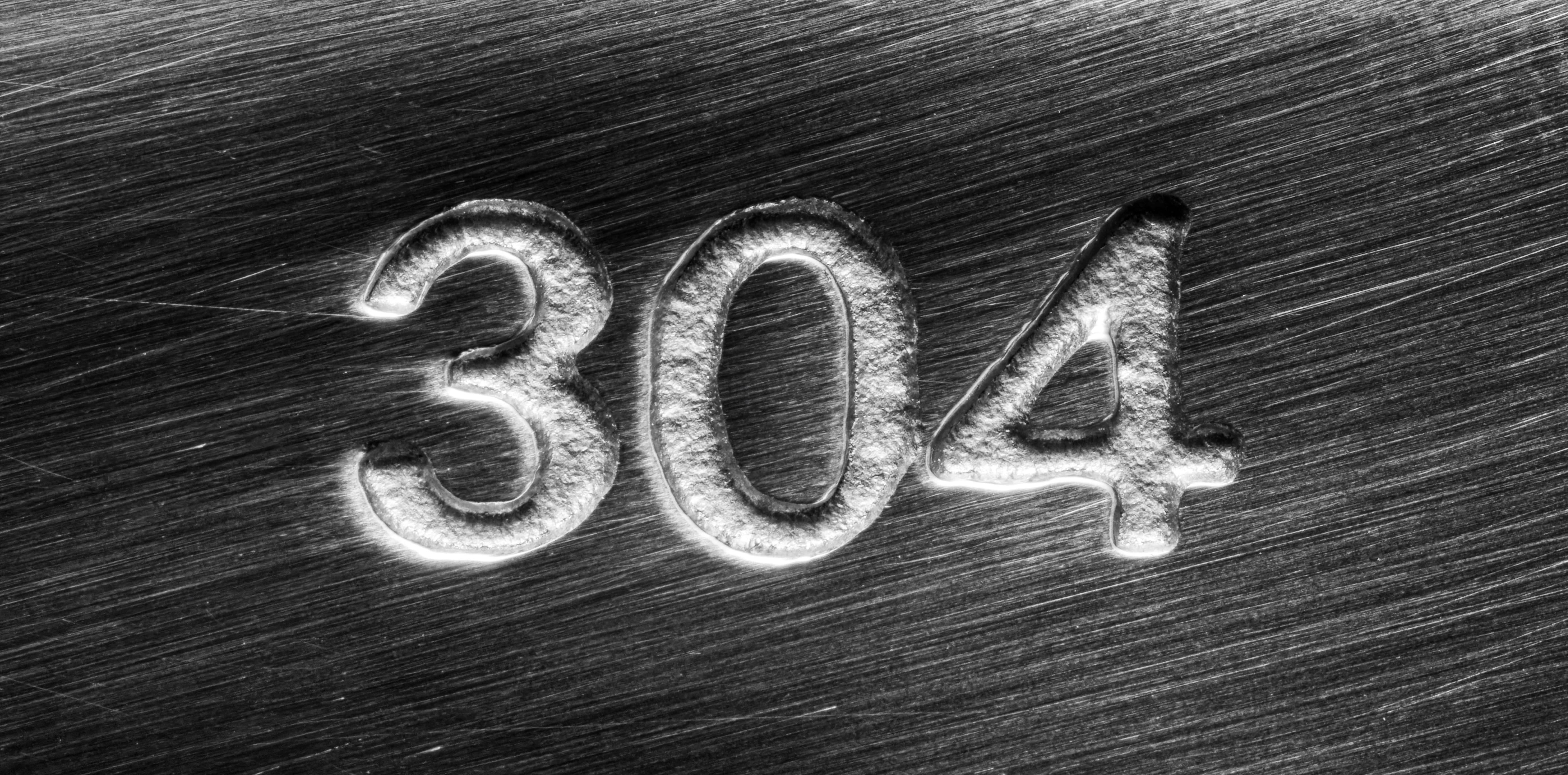 scratched,stainless,steel,numbers,304,or,three,hundred,four,on