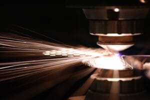 laser,cutting,of,metal,sheet,closeup.,laser,optics,and,cnc